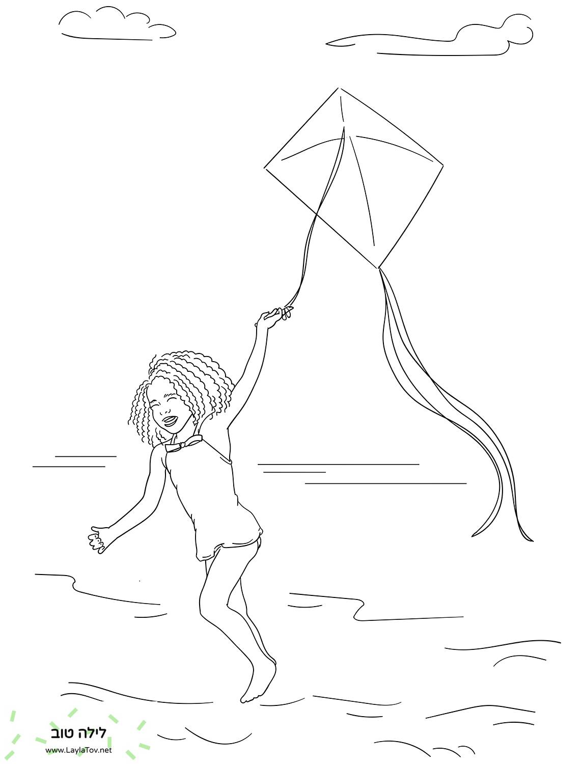 ילדה מעיפה עפיפון